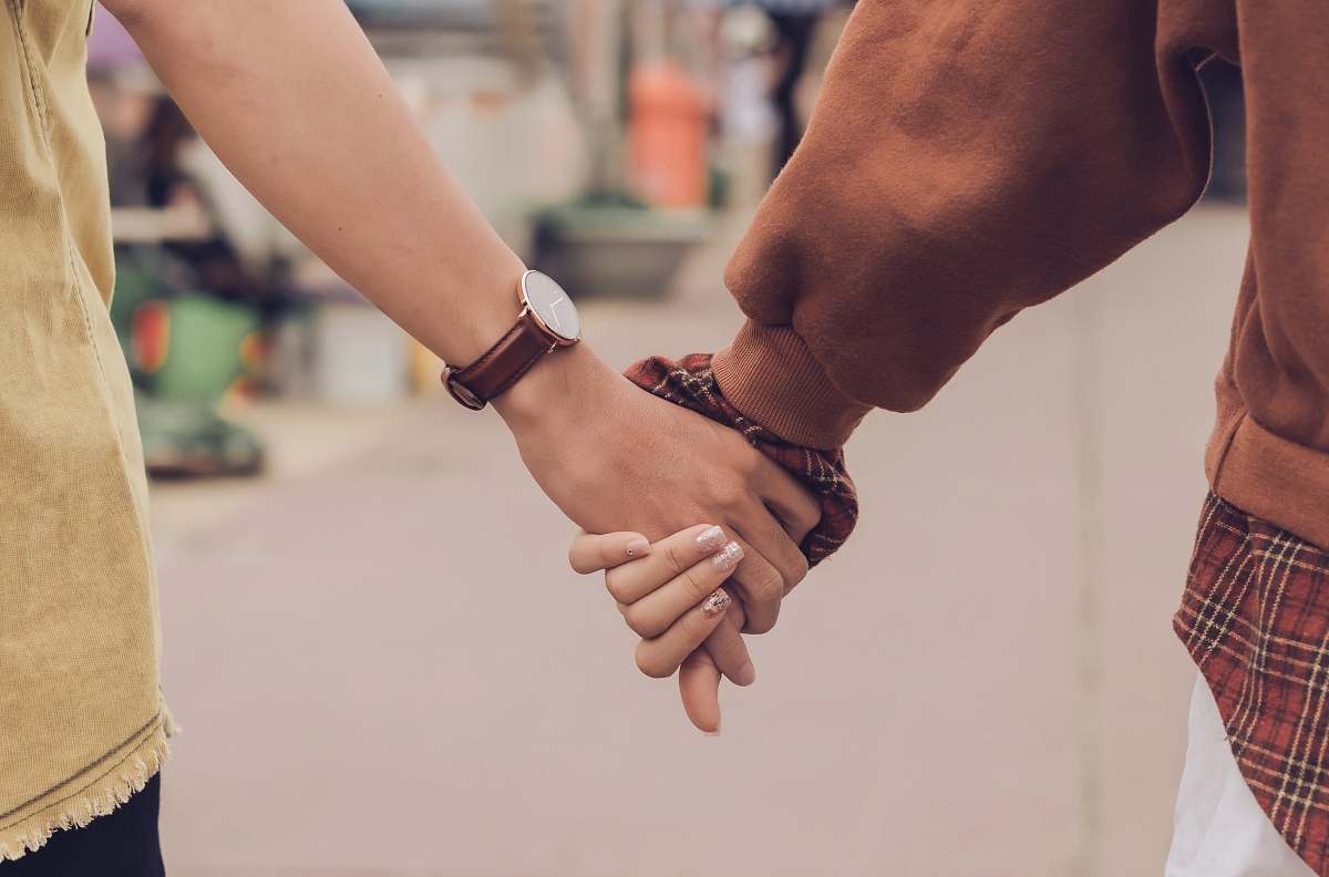person couple holding hands human